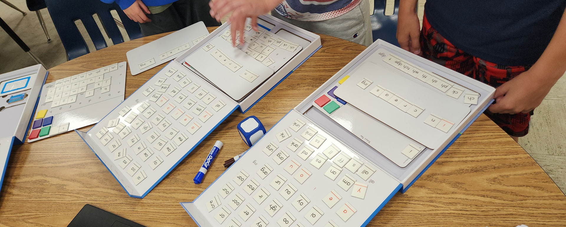 Kids using school materials